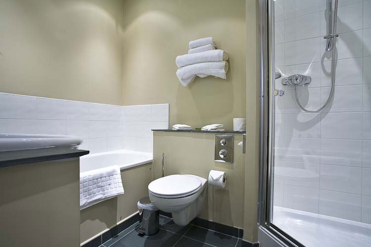 En-suite bathroom with bath and walk in shower